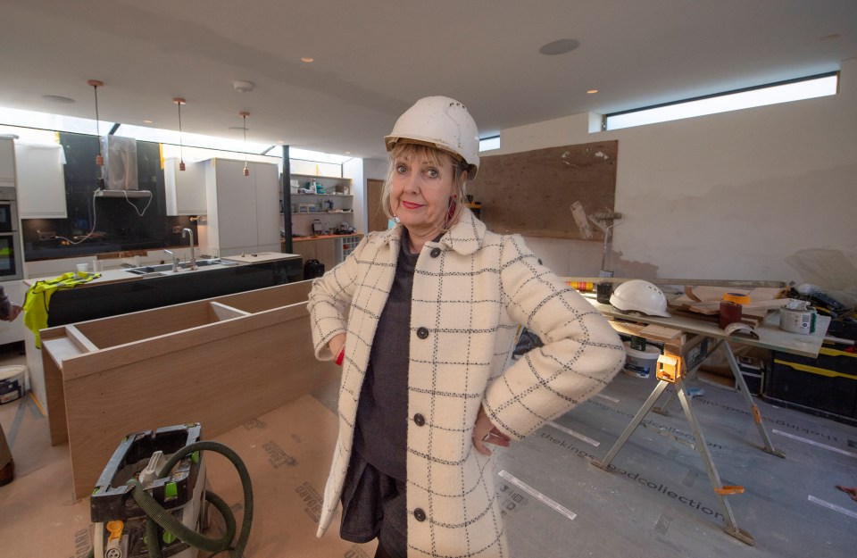  Aggie in her kitchen which has been transformed into a building site