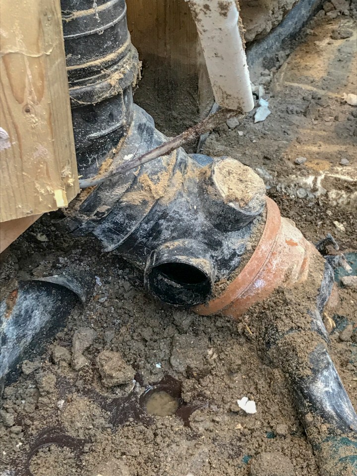  Even the toilet soil pipe poured raw sewage under the kitchen floor