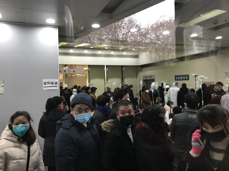 Patients queue up to seek treatment in Wuhan Tongji Hospital Fever Clinic