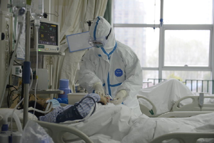 Medical staff attending to a patient at the The Central Hospital Of Wuhan Via Weibo in Wuhan