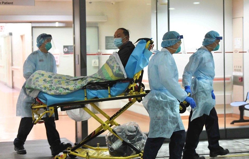  A patient with suspected coronavirus at the Prince of Wales Hospital in Hong Kong. Many of the victims have travelled from the epicentre Wuhan