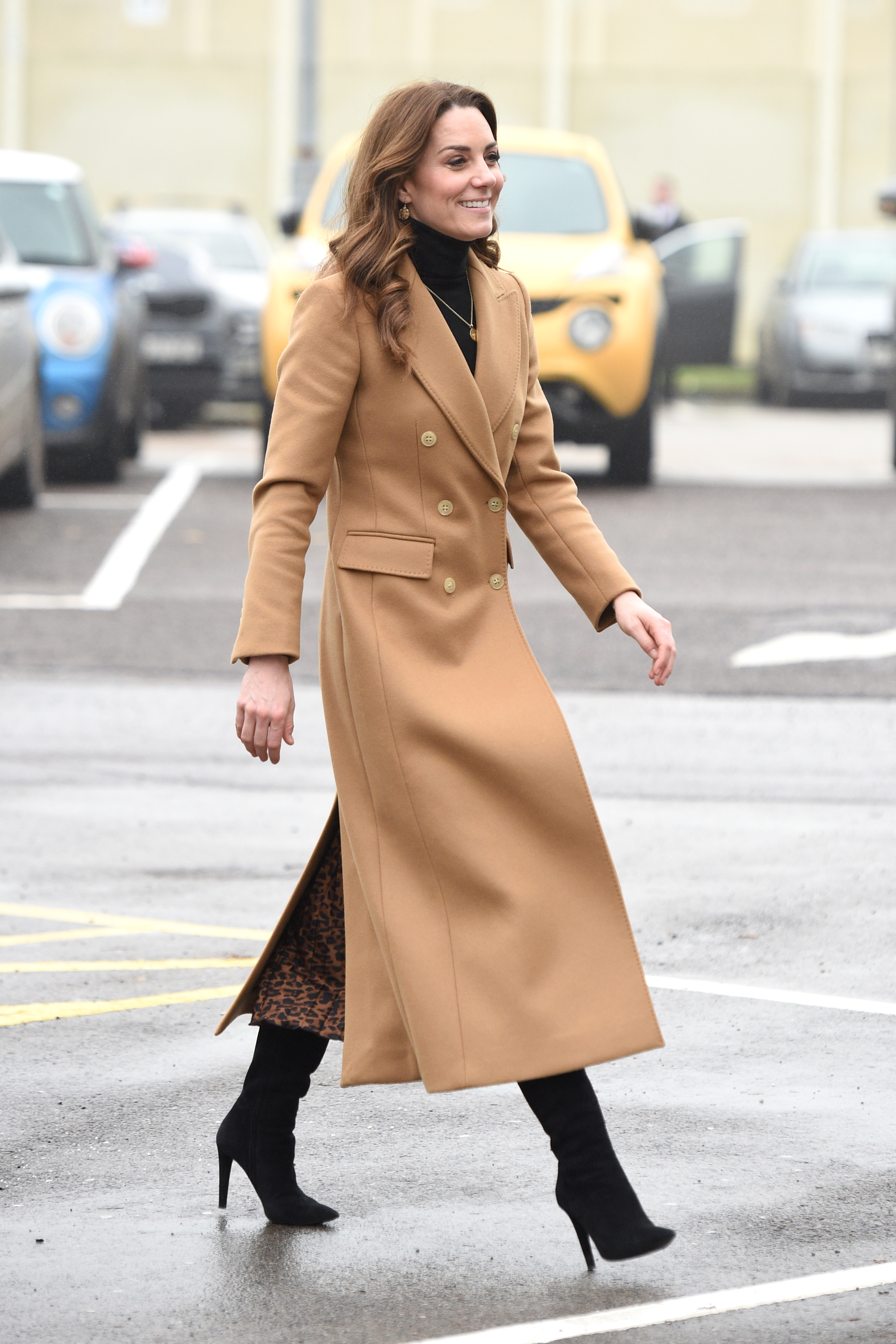 Kate was bang on trend with this toasty camel coat 