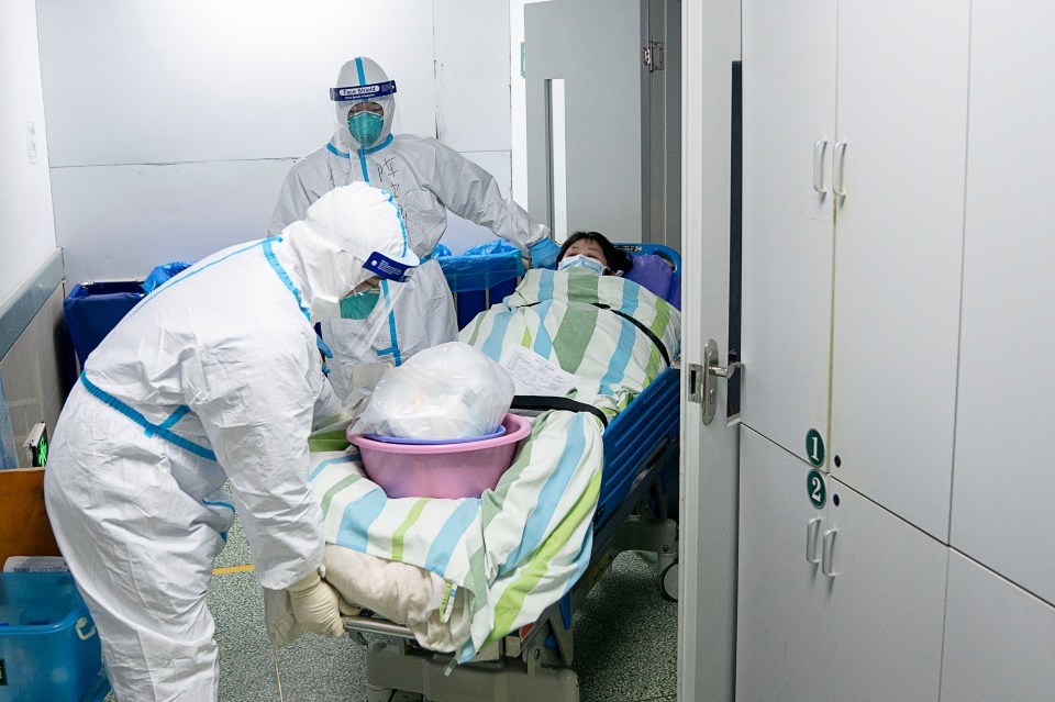  Staff at a Wuhan hospital are wearing adult diapers under their hazmat suits, it has been reported