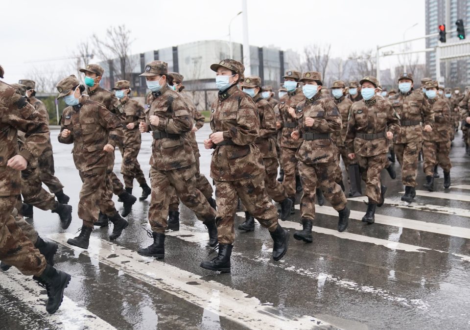  Members of a military medical team head for Wuhan Jinyintan Hospital in Wuhan, central China's Hubei Province to help out