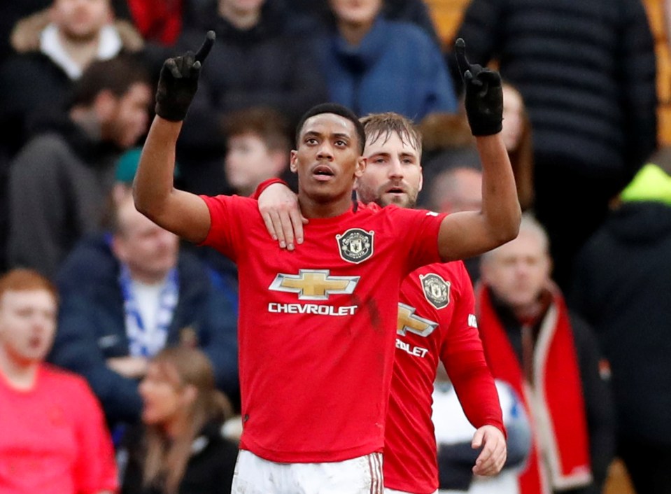  Frenchman Martial celebrates his goal with the game already put to bed