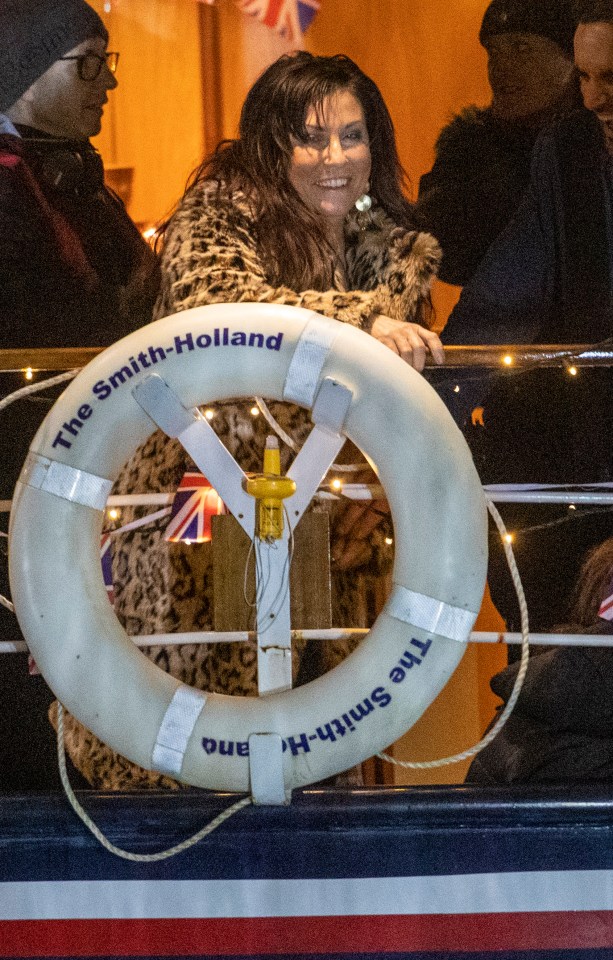  Jessie was snapped holding on to a life ring and looking merry while filming the soap's 35th anniversary special