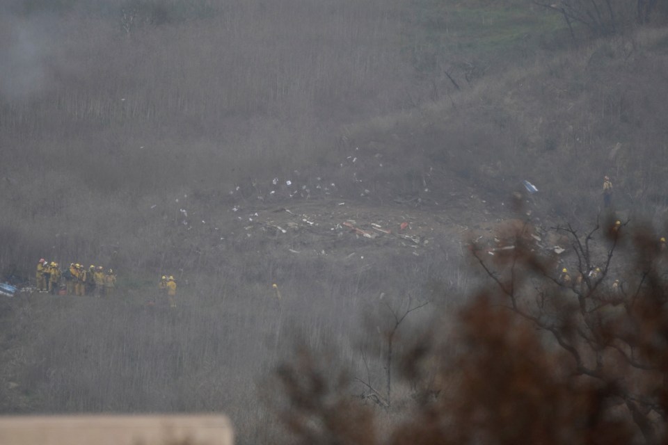  Harrowing images show the flaming wreckage strewn across the Calabasas hillside.