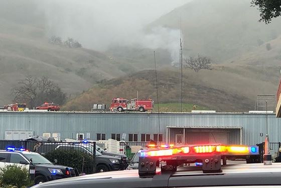 The fire can be seen from a nearby store