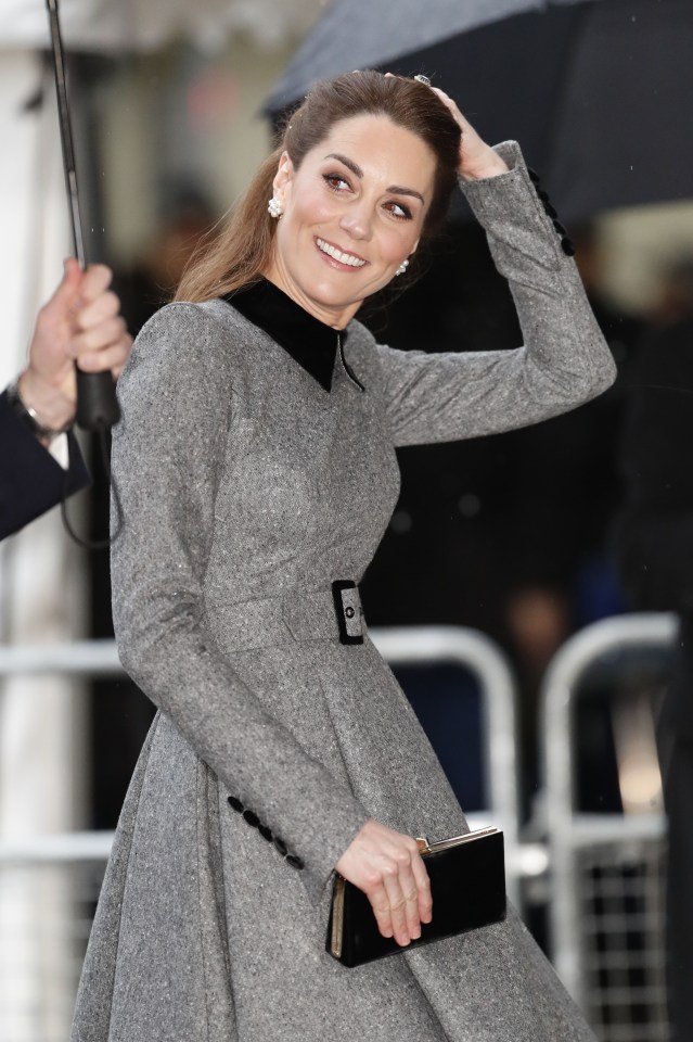  Kate managed to avoid the damp weather as she arrived at Westminster