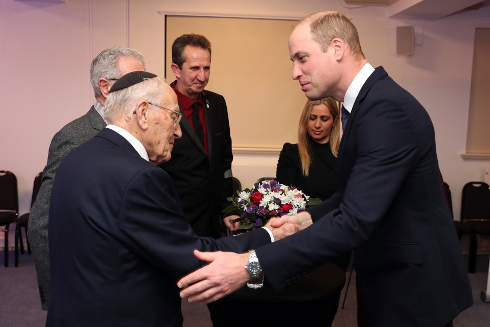  The Duke of Cambridge shakes hands with Manfred Goldberg