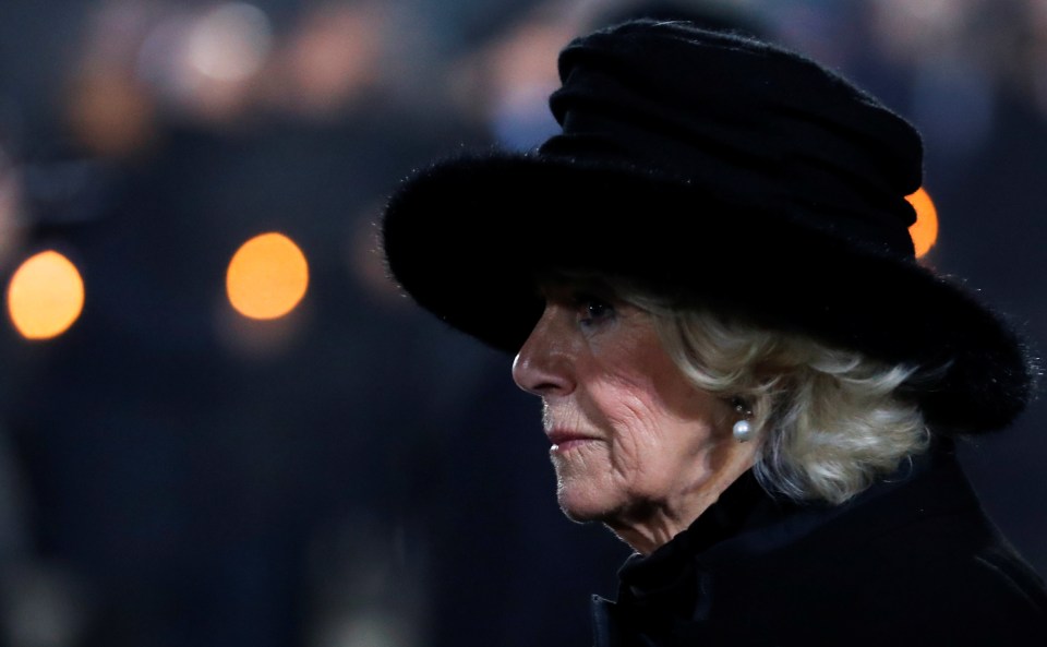  Camilla, the Duchess of Cornwall, looks sombre as she pays her respects