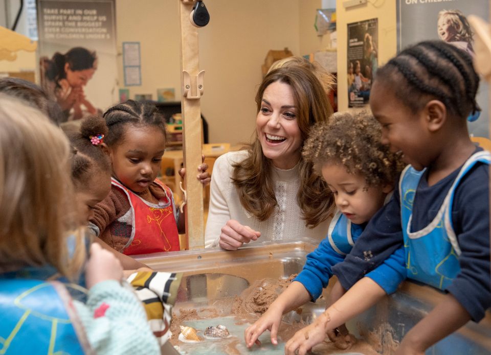  Sweet photos show Kate chatting with the nursery kids