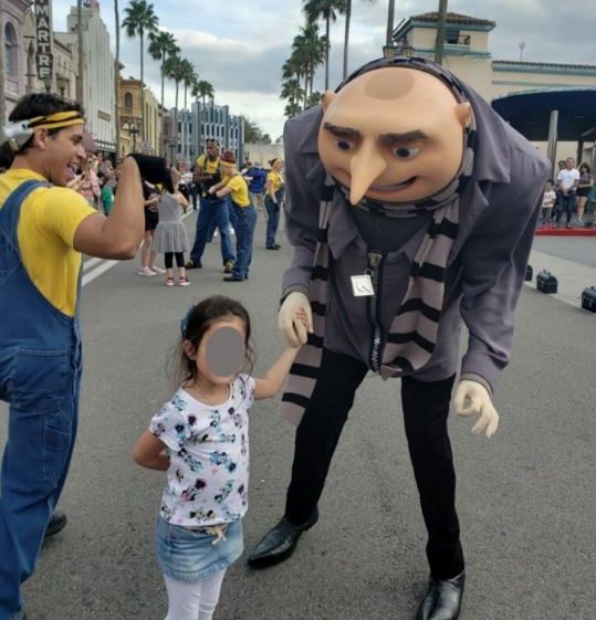  A Hispanic family has come forward to complain after spotting "Gru" making a gesture associated with racists