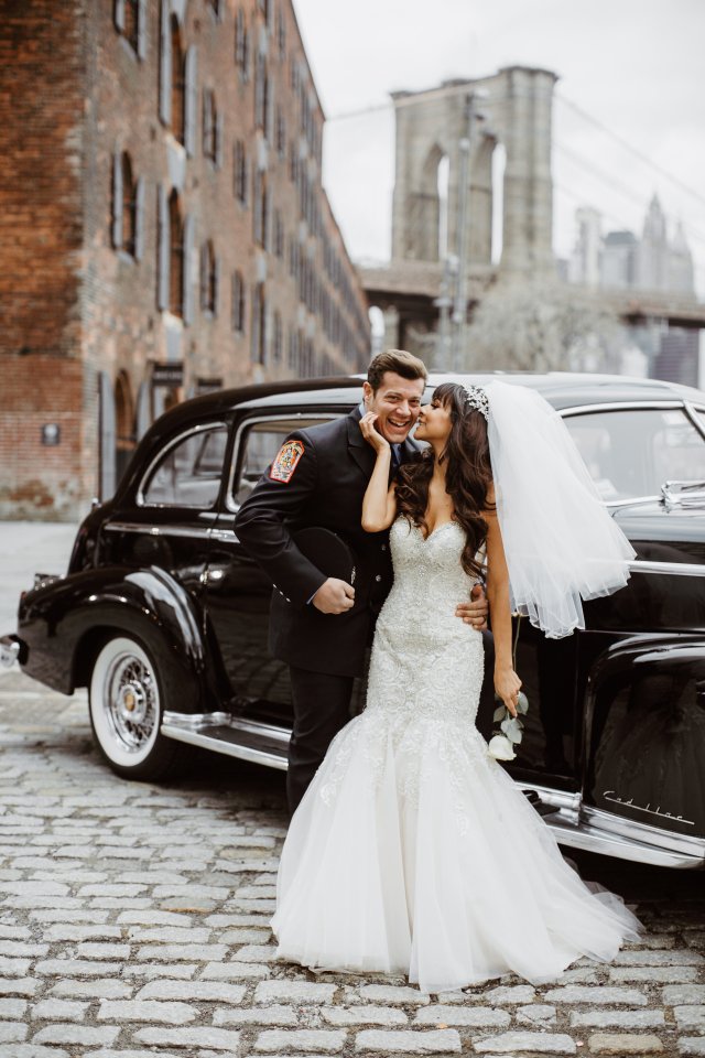  Roxanne walked down the aisle holding a single white rose to The Prayer by Andrea Bocelli and Celine Dion