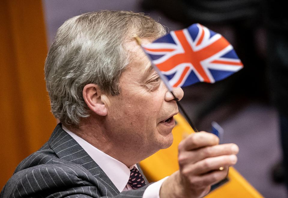  Nigel Farage waves a Union Jack on the last European Parliament session with Britain as a member