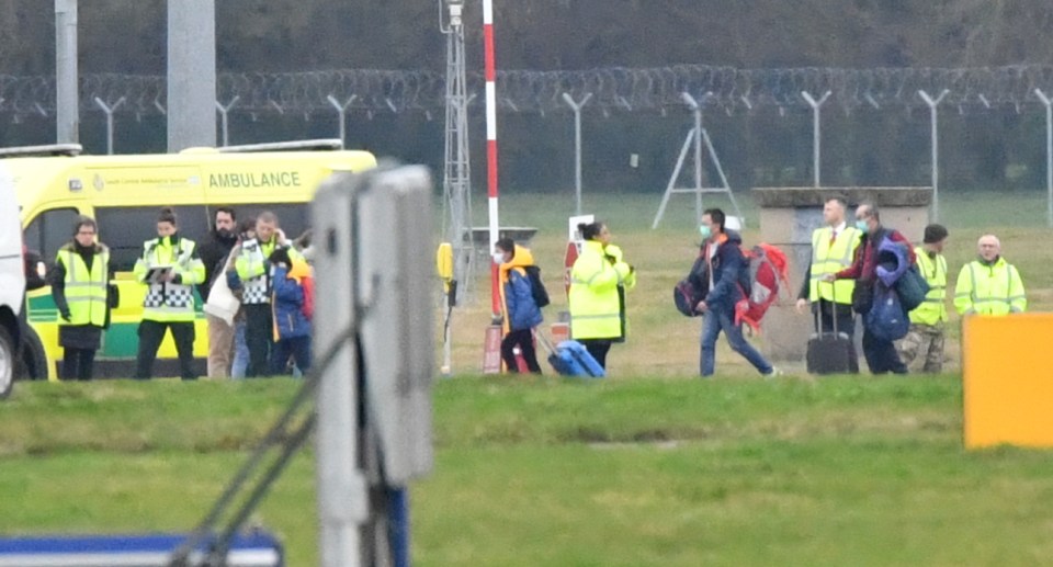  Passengers and medical staff arrived at RAF Brize Norton after being evacuated from coronavirus-hit Wuhan on Friday