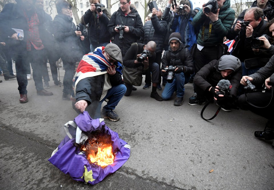  One man burned a flag as we prepared to leave