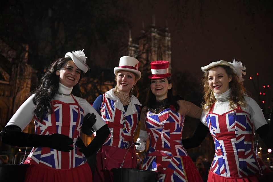  Women in Union Jack outfits celebrate Brexit in Westminster as the nation cheers the momentous occasion