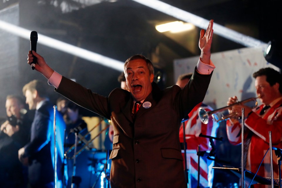  Nigel Farage throws his hands in the air after the clock struck 11pm marking Brexit