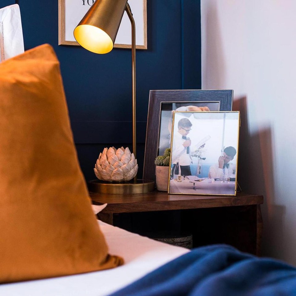  Freddy has a cute snap of him with his brother on his bedside table