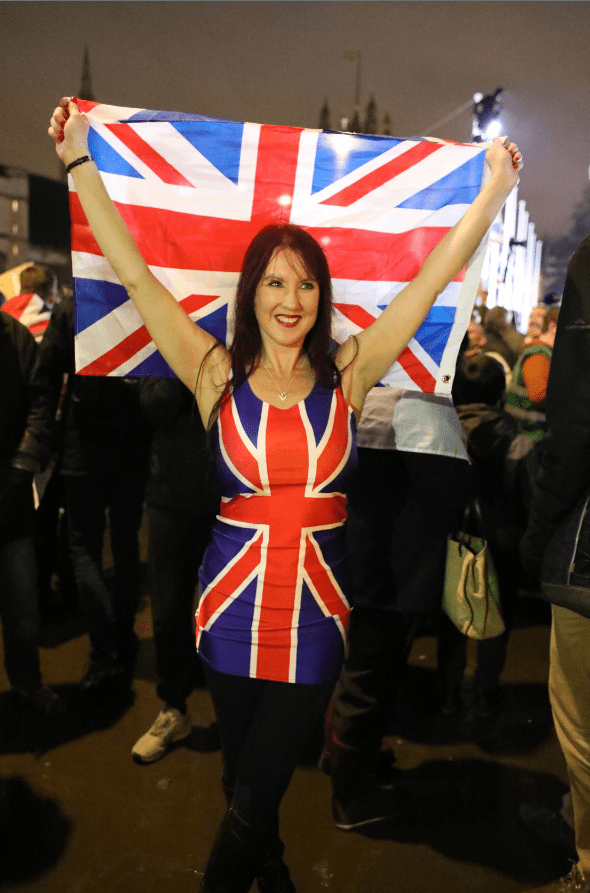  A Brexit supporter channels her inner Ginger Spice in a Union Jack dress