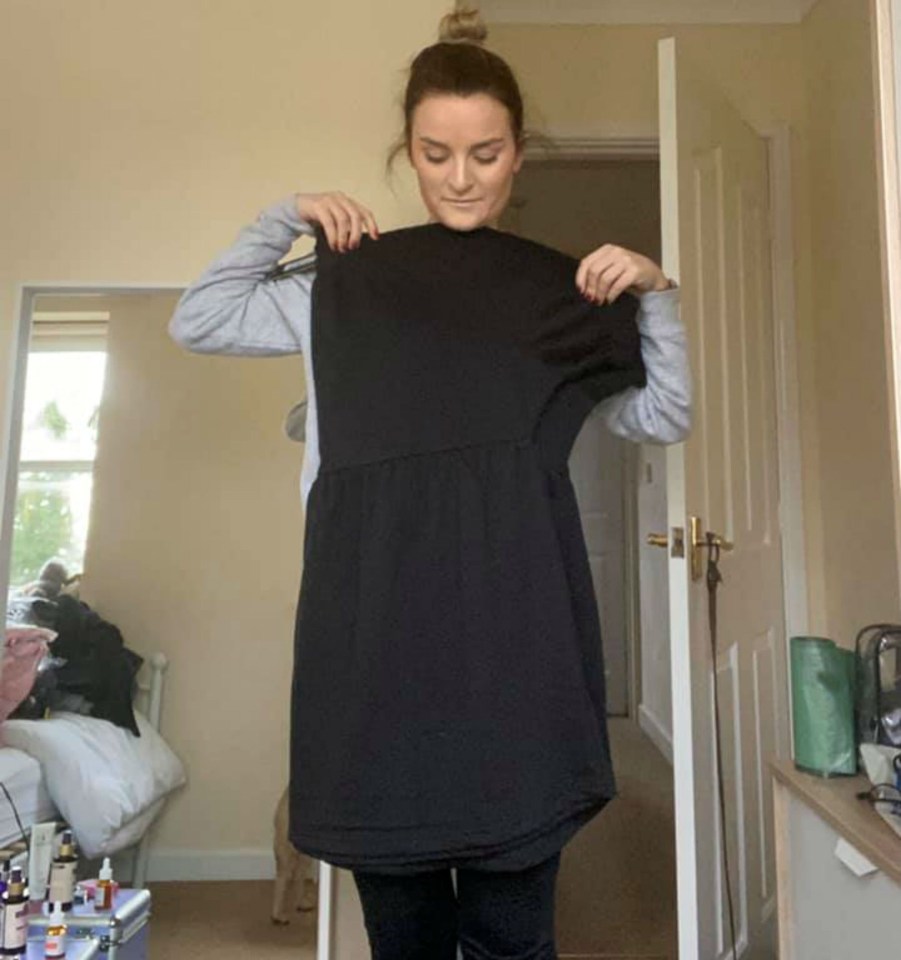 Charlotte folded the dress in half to show how it would still fit her