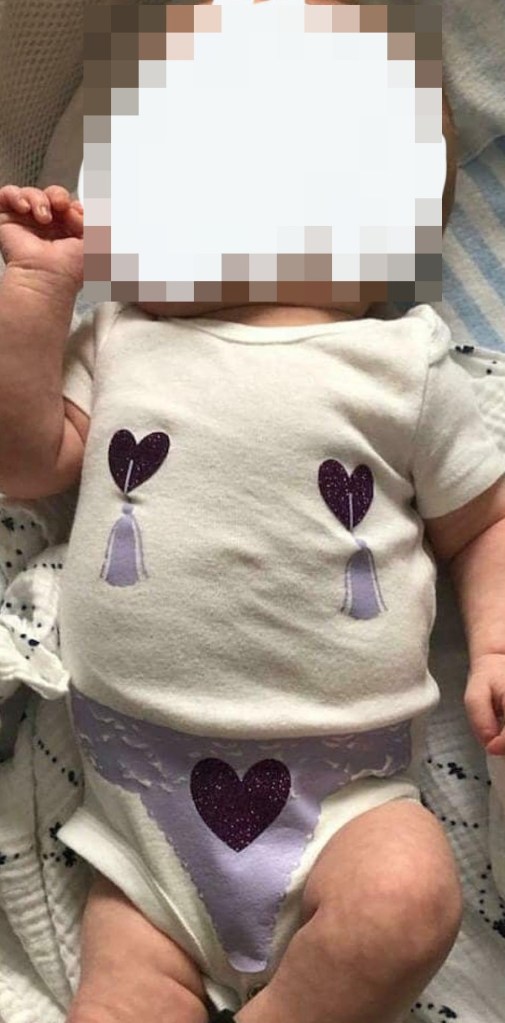 Parents have been left horrified after a grandma gifted a baby a onesie printed with a thong and nipple tassels 