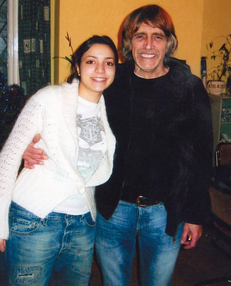  Meredith Kercher, then 15, smiles beside her doting dad John