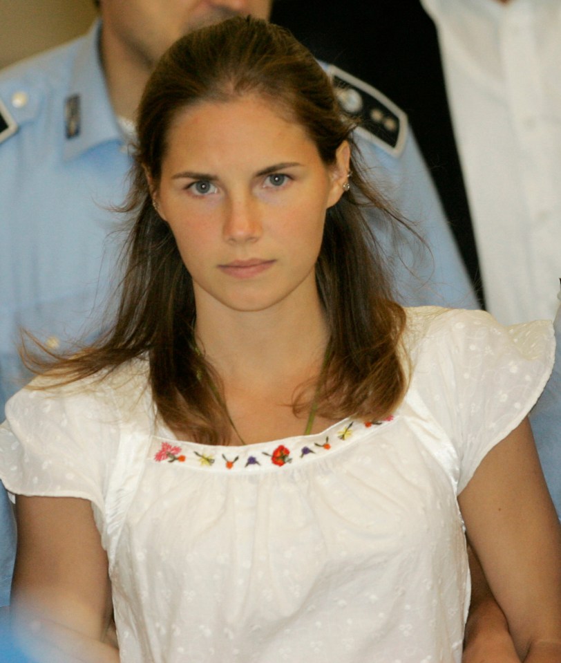  The young woman is seen being escorted by Italian cops in 2008 during the case