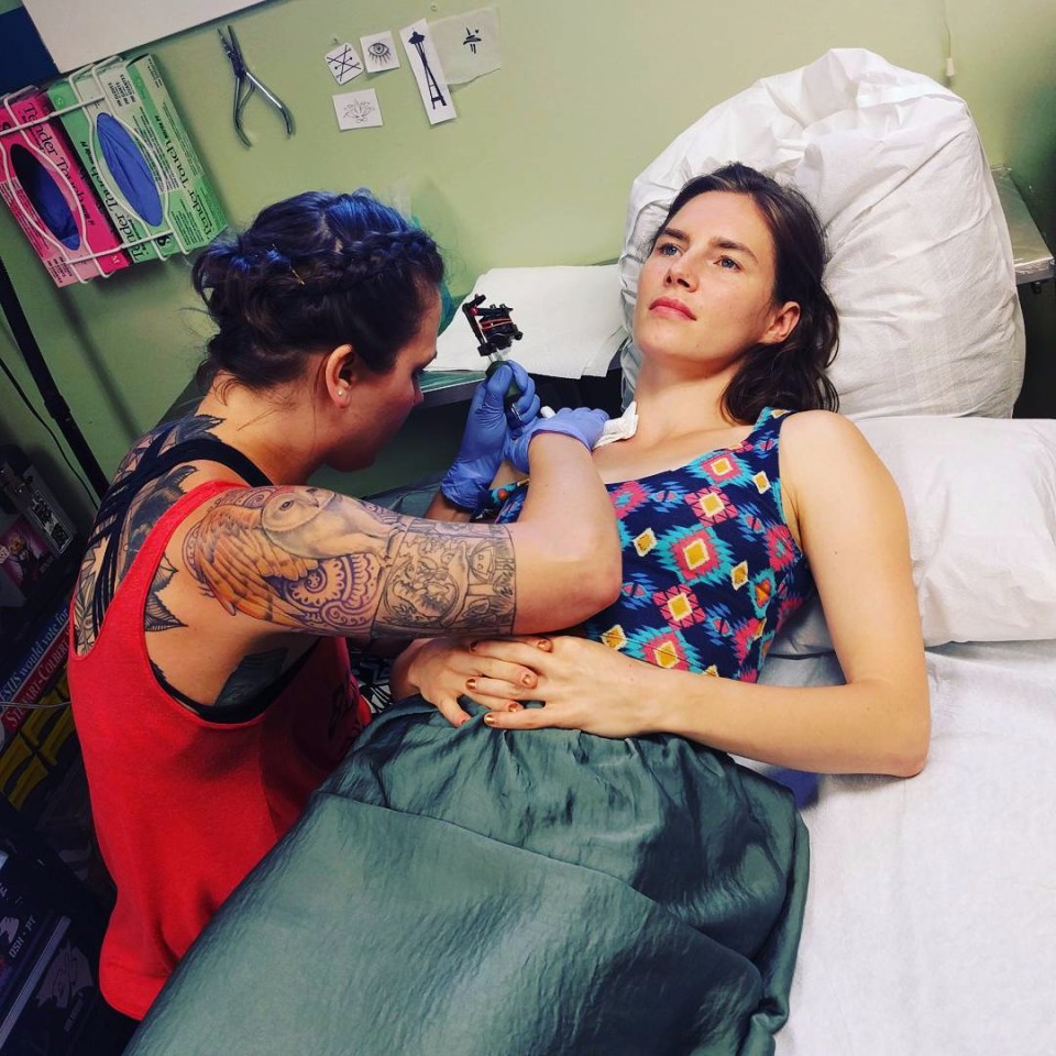  She is seen getting a tattoo on her shoulder in a revealing Instagram snap