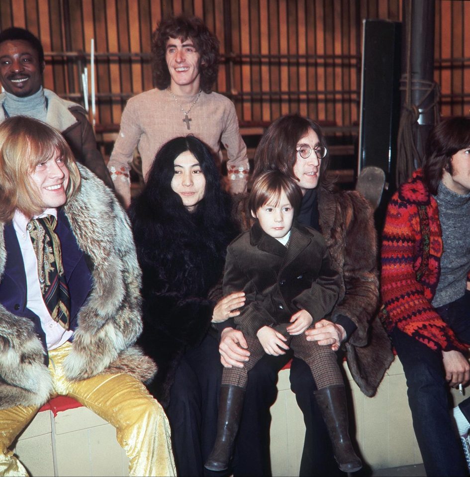  Julian sits on his father John Lennon's lap alongside Yoko Ono in 1968