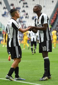  Paulo Dybala and Paul Pogba celebrate together