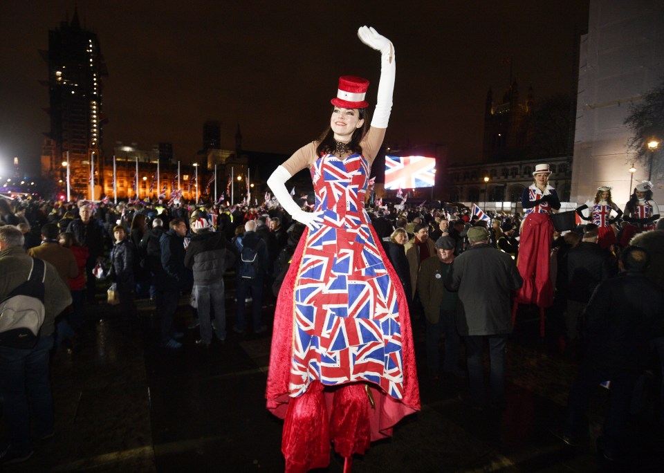 A Brexit supporter sports the Union Jack outside the Houses of Parliament