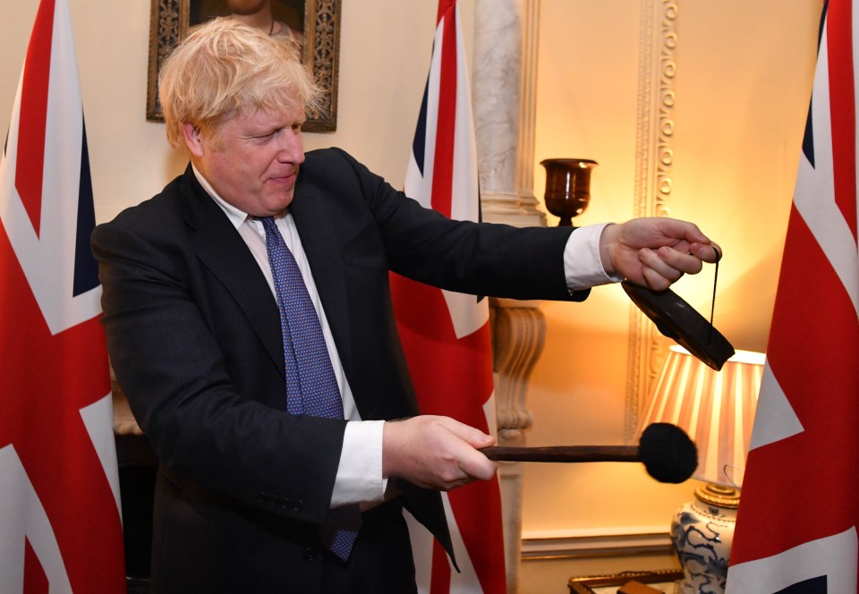 BoJo struck the gong 11 times with a tiny mallet at 11pm, standing in front of a portrait of Henry VIII