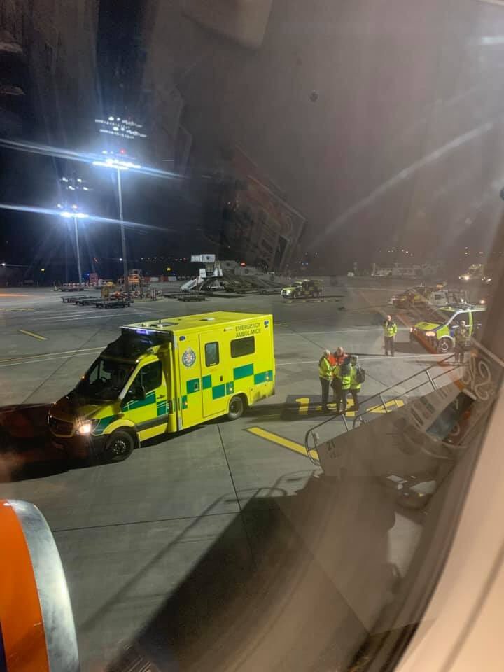  A man was removed from the flight and taken to an ambulance on the tarmac