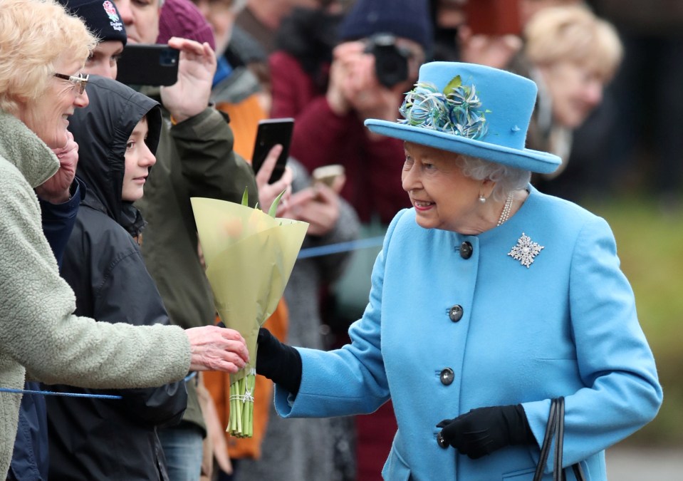 The monarch was pictured wearing the brooch with a powder blue suit as she arrived in West Newton near Sandringham 