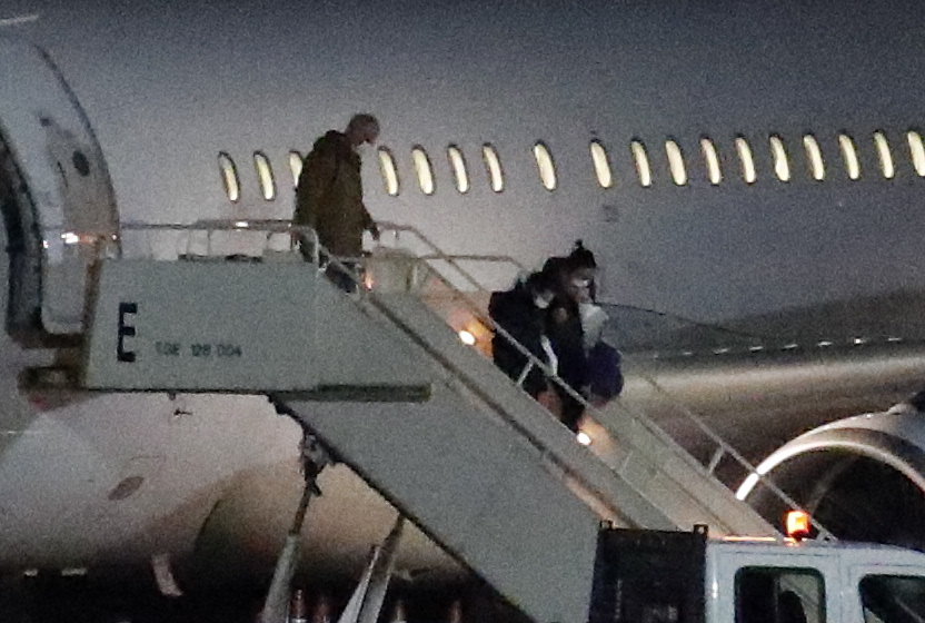  Coronavirus UK: Two more people, who are now quarantined in Merseyside, exit the jet which flew from Beijing