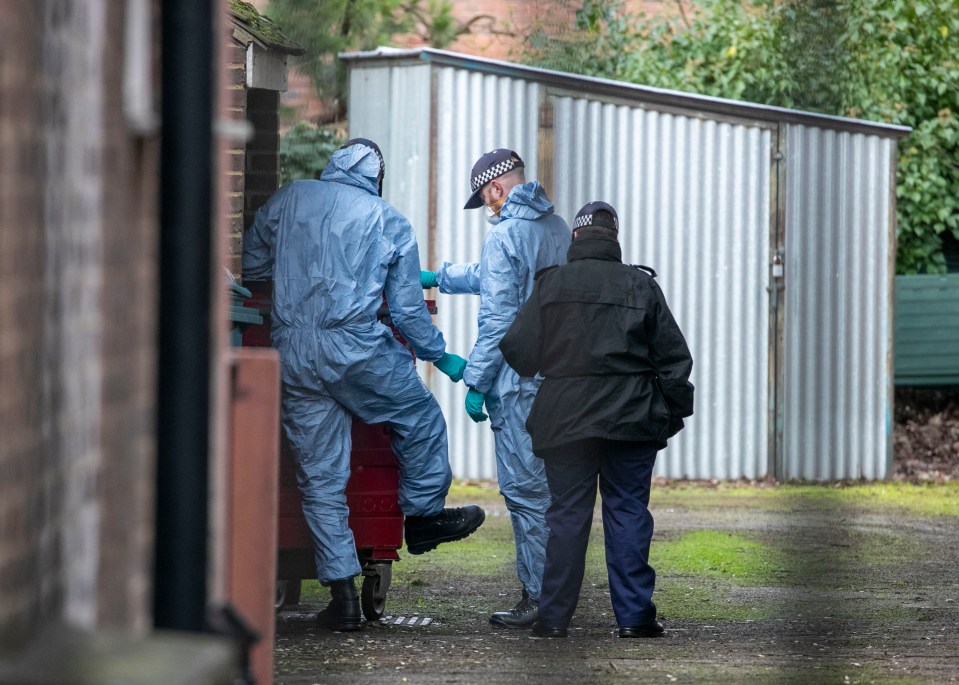  Forensic officers search near Amman's bail hostel in Streatham