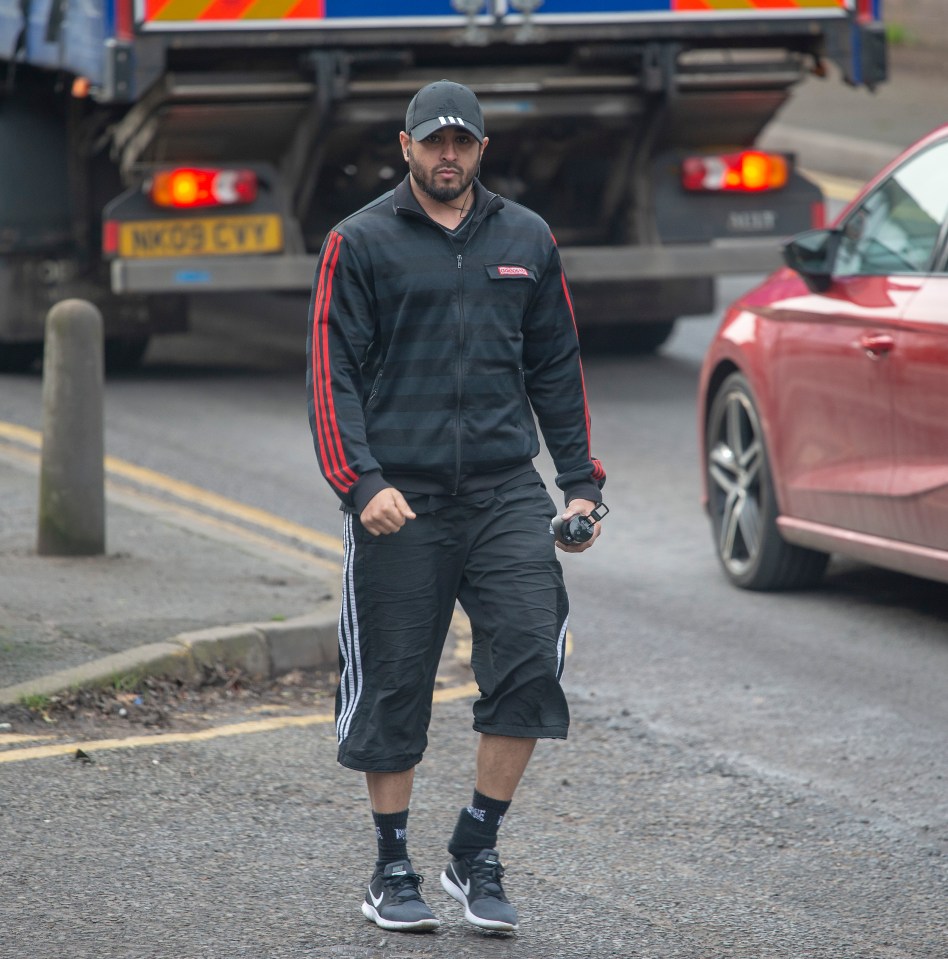  Mohammed Shahjahan, 34, was pictured walking to a local gym near his bail hostel in Staffordshire