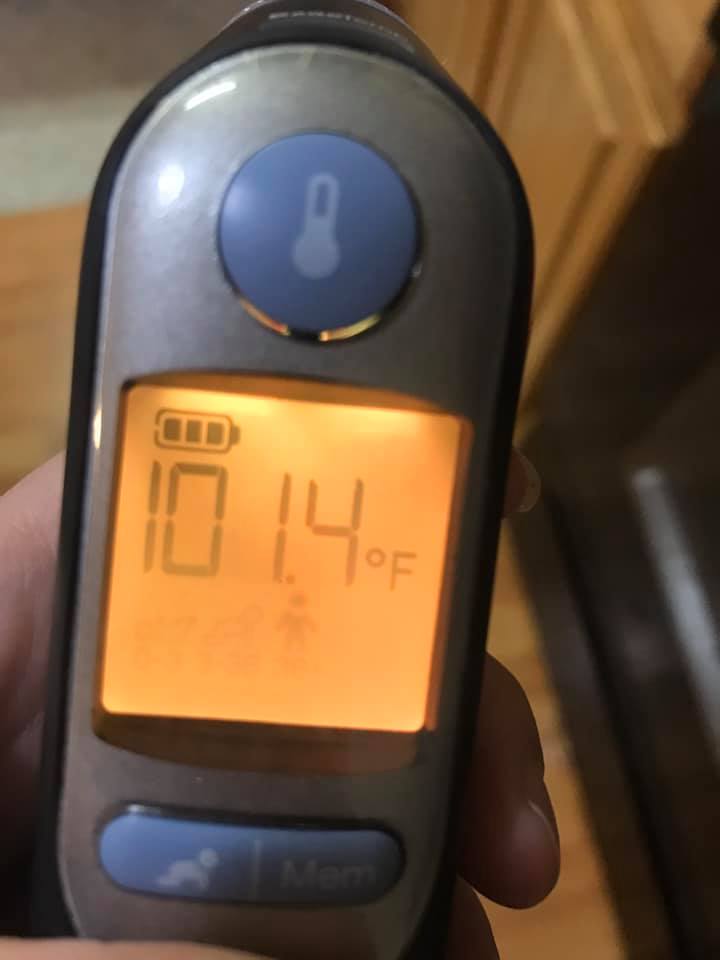 She took to Facebook to encourage fellow mums to keep their kids at home when ill, sharing a photo of her son's temperature