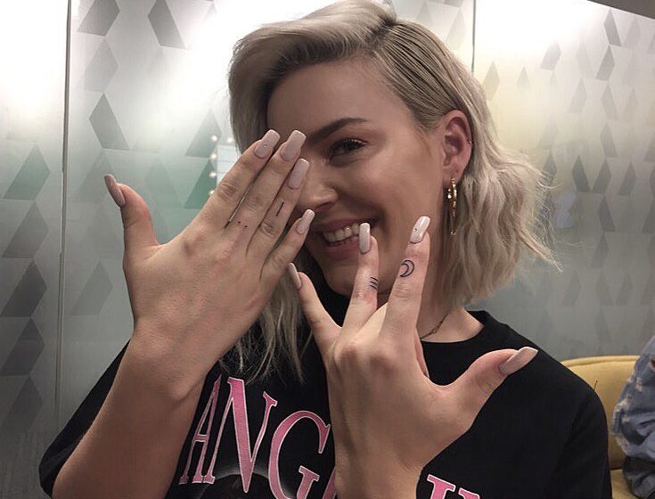  Anne-Marie is getting her moon tattoo removed as 'everyone has got one'