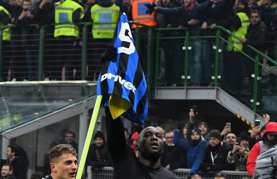  Lukaku held the corner flag aloft having notched the fourth goal