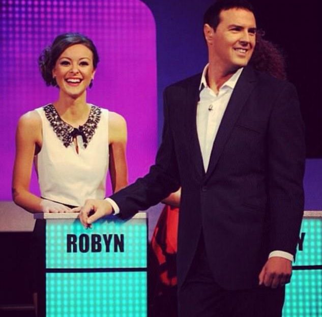  Robyn laughs beside host Paddy on Take Me Out series five