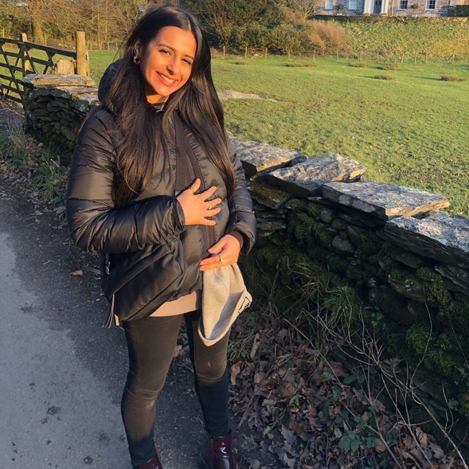  Sair Khan shocked fans with this photo of herself cradling her stomach