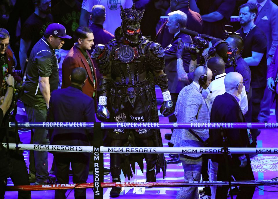  Deontay Wilder walked out to fight Tyson Fury wearing a jewellery encrusted costume