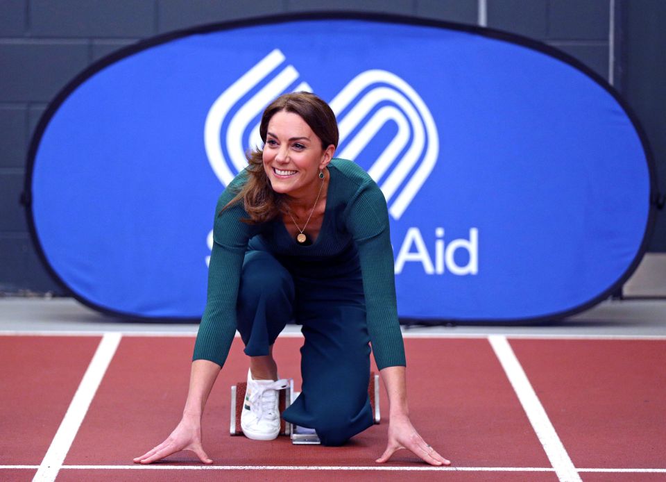  Kate Middleton looked excited as she crouched on the starting blocks to race