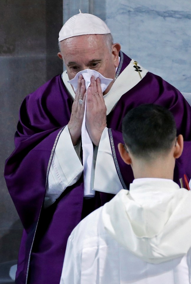  Pope Francis blows his nose during an Ash Wednesday mass yesterday