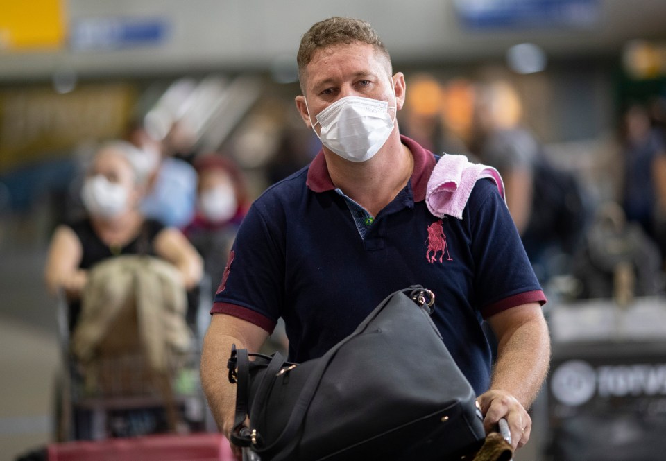  A man wears a mask as a precaution against the spread of coronavirus