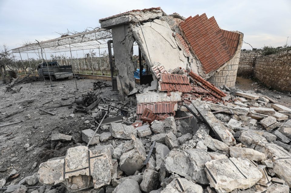  A building destroyed in heavy bombardment by Assad's troops in a residential area in Idlib, where 11 civilians including five children died