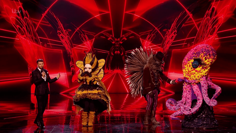  All three costumed singers during the final